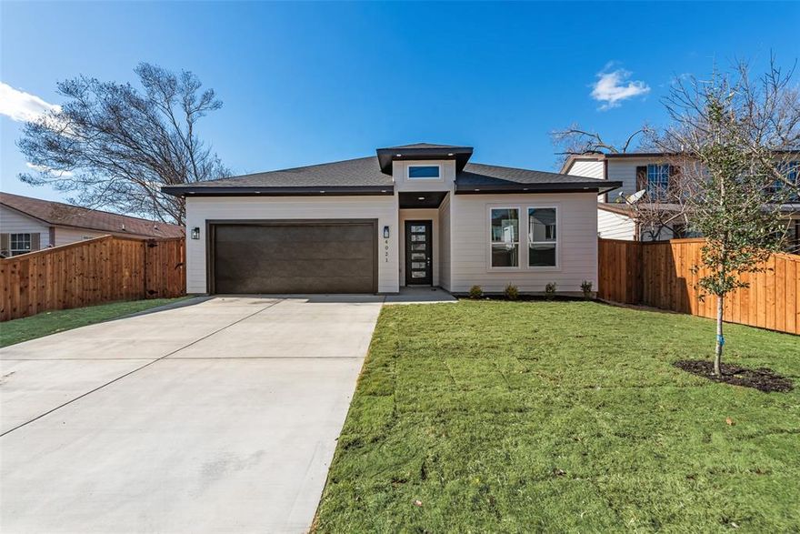 Step into this stunning new construction home, perfectly situated in a prime Dallas location. Designed with modern living in mind, the open-concept layout features stylish decorative lighting, premium finishes, and a cozy fireplace that brings warmth and charm to the main living space. The kitchen stands out with custom cabinetry, quartz countertops, and a spacious center island, creating the perfect balance of form and function. Seamlessly connecting to the dining and living areas, the setup is ideal for both entertaining and everyday living. The primary suite offers a private retreat
with a spa-like ensuite bathroom and a generous walk-in closet. Three additional bedrooms provide versatile space for family, guests, or a home office. Outside, you'll find a large backyard enclosed by a wooden fence, offering plenty of room for relaxation or recreation. The seller will install a stainless steel dishwasher, range, and built-in microwave three days prior to closing.