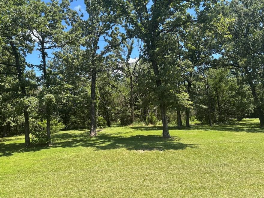 Experience Peace and Privacy in this beautiful partially wooded 1-acre lot surrounded with nice homes on acreage. Rural tranquility and yet convenient to shopping and nearby park, and Lake Tawakoni is just a few miles away!  Easy access to both I-30 and Hwy 276! Existing water tap, and electricity at street. Surrounded by nature, you’ll enjoy the serenity of country living, yet close to amenities. Plenty of room for RV or boat parking. Deed restrictions. Call listing agent for more details. No mobiles allowed.