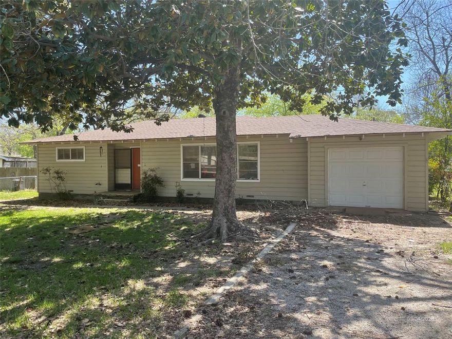 Spacious brick home in a quiet, established Azle neighborhood on a street that is shaded by mature trees. The large backyard offers exceptional flexibility with room for storage, a workshop, gardening, play space, or future outdoor improvements. Inside the great layout and generous room sizes offer some versatile spaces ready for a your personal touches. The oversized living area provides plenty of room for gathering and entertaining. The kitchen offers abundant cabinetry and enough space to add an island or additional prep area. Utility area is located in the garage. All three bedrooms feature generous storage, while the oversized primary bedroom serves as a comfortable retreat. Hardwood floors throughout much of the home add warmth, charm, and timeless appeal. With its great lot, roomy layout, flexibility and potential, this property offers a wonderful opportunity for a buyer to really make it their own.