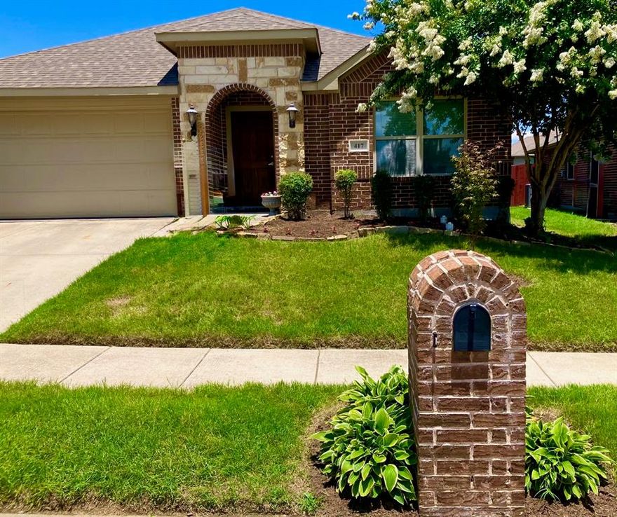 Welcome to this beautifully landscaped custom home nestled in a highly sought-after neighborhood within an excellent school district and walking distance to the elementary school. Charming open living area with custom window treatments and crown molding throughout. This 4-bedroom, 2-bath residence offers a spacious layout that could accommodate a home office and features a large primary suite; complete with a cozy sitting area—perfect for relaxing after a long day. Step into the heart of the home with custom lighting features, where the kitchen boasts elegant sand pebble stone tile flooring, creating both warmth and sophistication. The brick and stone exterior adds timeless curb appeal, while the newer roof and hot water heater provide peace of mind. Enjoy the benefits of an advanced air and water purification system for a healthier living environment. Quiet outdoor living is a delight with a lush lawn complementing the lovely white crepe myrtle and Japanese maple tree. Spacious backyard sharing a mature peach tree, an extended covered patio ideal for grilling and entertaining family and friends. A sprinkler system in both front and back yards for easy maintenance. The community enhances your lifestyle with access to a sparkling pool, clubhouse, playground, and custom sport-flooring basketball court—plenty of options for recreation and relaxation. Located with easy access to major highways, shopping centers, and beautiful Lake Lavon for fishing and boating enthusiasts. Police and fire departments are conveniently nearby for added safety and peace of mind. Don’t miss your chance to own this stunning, move-in ready home that combines comfort, style, and convenience in one perfect package!