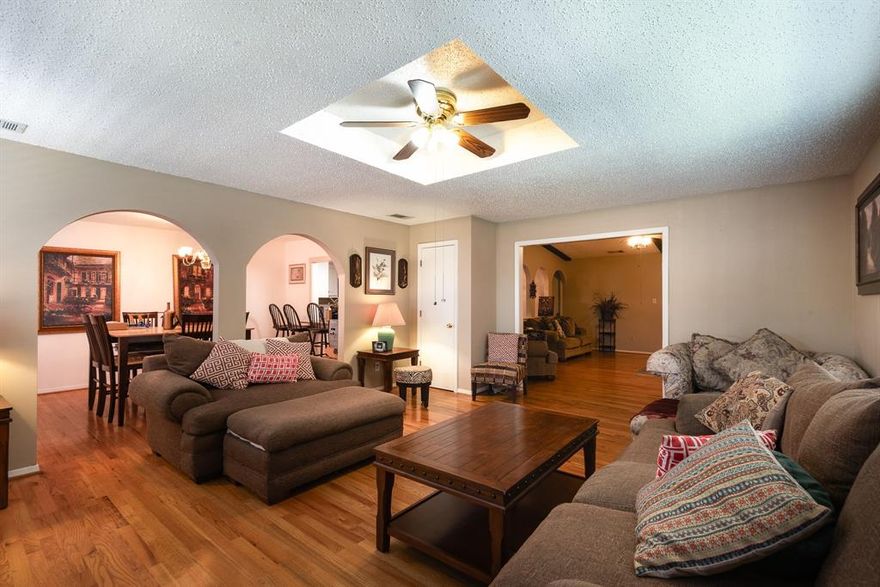 Beautifully updated home ready for you! This spacious property features two large living areas, a generous formal dining space, and a kitchen with a cozy breakfast nook. A large window-style cutout from the kitchen to the formal dining room creates an open, connected feel — perfect for gatherings and entertaining.

The kitchen is equipped with granite countertops, a stainless sink, and a drop-in gas range. Enjoy the warmth of wood floors throughout and a gas fireplace that adds charm and comfort. Offering three bedrooms and two bathrooms, this home provides ample space for family or guests.

The backyard is fully enclosed with a chain-link fence and includes a gated driveway for added convenience. Located just minutes from I-20, commuting is a breeze. Don’t miss this opportunity to own a move-in-ready home in a great location!