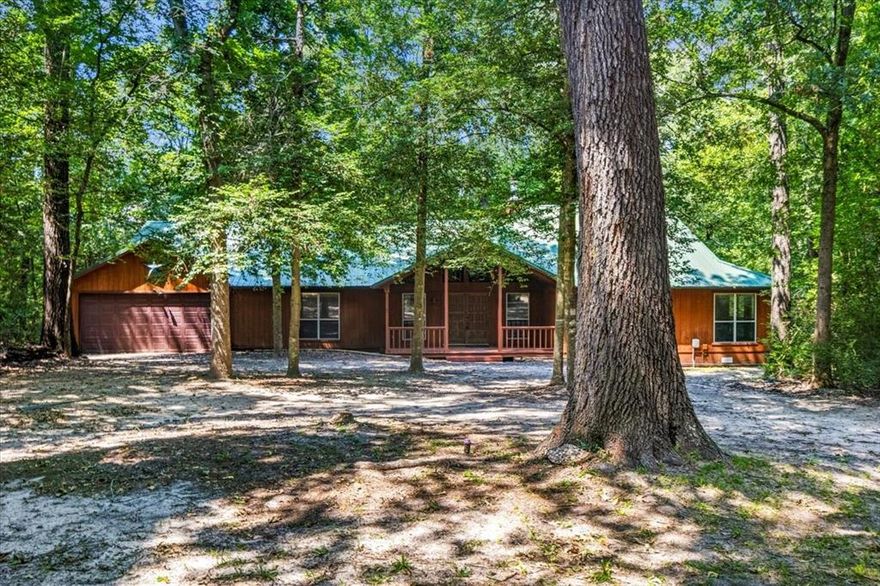 Seller is offering $5000 in concessions!!
Tucked away on a secluded, wooded lot in the desirable gated community of Holly Lake Ranch, this stunning 3-bedroom, 3-bathroom home offers over 3,085 sq. ft. of thoughtfully designed living space. Every bedroom has its own private bathroom—two of which feature bonus rooms, perfect for a home office, nursery, or hobby space.

Step inside to an open-concept living and kitchen area, ideal for entertaining, with a massive kitchen, abundant cabinet space, and a beautiful stone fireplace anchoring the living room. Enjoy meals in the separate formal dining room and take advantage of the large laundry room and an extra space for a walk-in pantry or additional storage.

Relax in the sunroom or enjoy your morning coffee on the screened-in porch, taking in peaceful views of the surrounding woods and visiting deer. The home also features a covered deck and a side deck with private entrances to the two guest bedrooms, as well as a fenced-in area for pets and a charming front porch for sitting back and enjoying nature.

Recent updates include all-new appliances, updated electrical, and a fully remodeled bathroom with both a bath and shower.

Nestled off the road and surrounded by tall pines and hardwoods, this home offers unmatched privacy while being just minutes from the abundant amenities Holly Lake Ranch is known for—including 5 private lakes, tennis and pickle ball courts, swimming pool, playgrounds, nature trails, and 24-hour gated security.

This spacious and serene home is priced to sell—schedule your showing today and experience East Texas living at its finest!