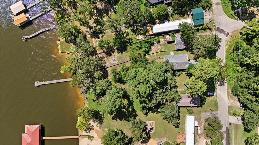 Welcome to 907 Beachside Dr in Chandler, TX!
This move-in-ready Lake Front home sits on 2 spacious lots and has been thoughtfully updated with new flooring, freshly painted walls and ceilings, updated toilets, new ceiling fans, electrical switch covers, and a recently serviced AC. Located near Lake Palestine, the property offers the perfect blend of comfort and potential—you can even build your own dock! Whether you're looking for a full-time residence or a peaceful weekend getaway, this property checks all the boxes. No dock but on 2 lots. No Survey. Buyer will need to purchase.