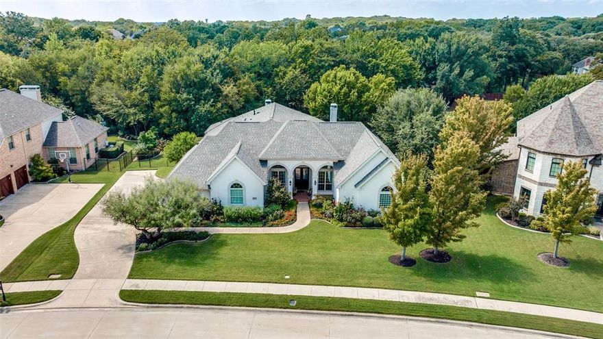 Elegant Single-Story Home in Sought-After Johnson Place Estates. Discover refined living in this beautifully designed single-story home. Thoughtfully crafted for comfort and style, this residence offers 4 spacious bedrooms, each featuring its own ensuite bath, providing ultimate privacy and convenience. The open floor plan seamlessly connects the formal living and dining areas with the inviting family room and gourmet kitchen—perfect for both everyday living and entertaining. The oversized primary suite is a true retreat, complete with a luxurious bath featuring dual vanities and his-and-her water closets. Step outside to your own private oasis: a lushly landscaped backyard with mature trees, a sparkling pool and spa, and a covered patio with pergola for shaded relaxation. The outdoor kitchen and living area with retractable screens make this space ideal for year-round enjoyment and effortless indoor-outdoor living. This property offers the perfect blend of elegance and manageability—an excellent choice for downsizers who don’t want to sacrifice luxury or location. This home backs to a green belt and is across the street from Johnson Park. You will experience the best of Johnson Place Estates living—where sophistication meets ease in a truly remarkable setting. Open Enrollment CISD!