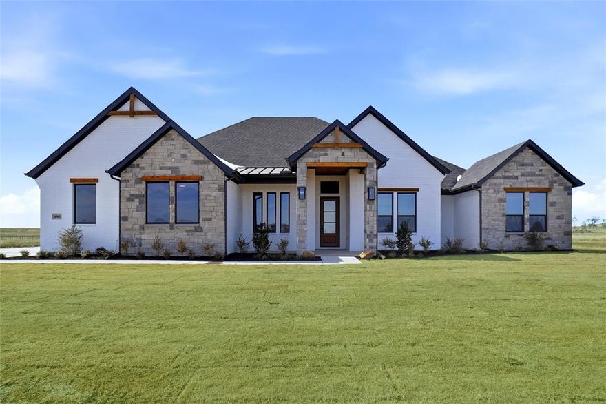 BUILDER OFFERING 10K IN BUYER INCENTIVES! PLUS, PREFERRED LENDER INCENTIVES! Set within the peaceful beauty of Eagle Creek Subdivision, this exceptional residence is a refined expression of luxury, space, and modern comfort. No HOA. 6961 Eagle Creek Drive welcomes you with striking curb appeal on over an acre lot with expansive grounds, and an immediate sense of privacy. An ideal retreat just beyond the city’s pace. Inside, the home unfolds with grand yet inviting interiors, thoughtfully designed for both elegant entertaining and everyday living. The gorgeous living room beams with black accents throughout make this home absolutely stunning. This amazing 4-bedroom, 2-bathroom home offers a wonderful layout. The office contains a gorgeous accent wall. Open, light-filled spaces are accented by upscale finishes, custom details, and seamless flow throughout. The living areas feel warm and sophisticated, anchored by architectural character and views that connect the indoors to the surrounding landscape. The kitchen stands as a true centerpiece—beautifully appointed and perfectly suited for gatherings large or small. Primary bathroom offers separate vanities, oversized shower and stand-alone tub with nice size walk-in closet. This primary bedroom suite provides tranquil escapes, while spa-inspired bathrooms elevate comfort with a touch of indulgence. Every detail reflects quality craftsmanship and a timeless aesthetic. Step outside to experience the full scope of the property, where wide-open skies and serene surroundings create endless opportunities for relaxation, entertaining, or future customization. Whether enjoying quiet evenings or hosting unforgettable events, the outdoor setting offers both freedom and luxury.