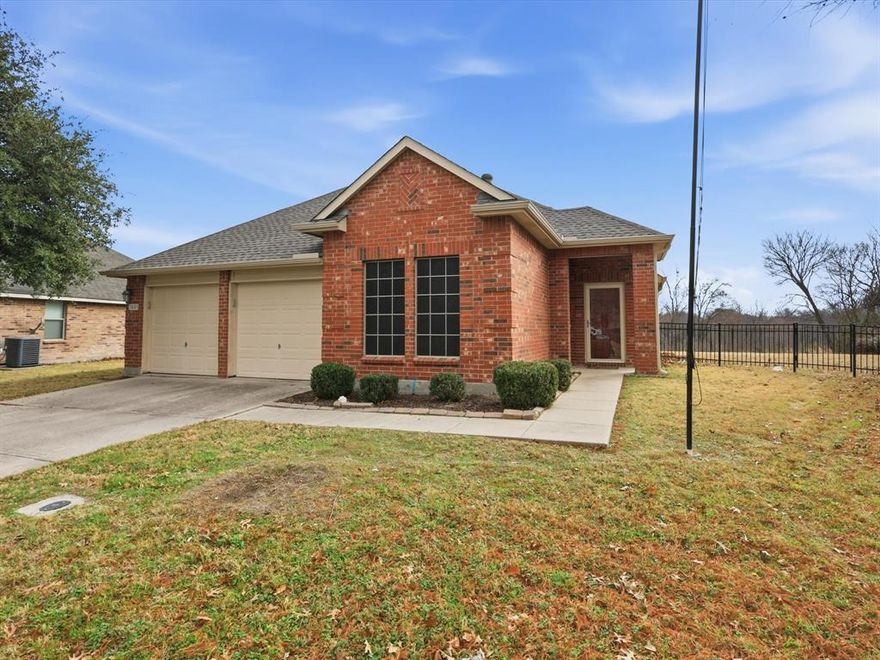 Charming Single-Story Home on a Premium Corner Lot. Welcome to this beautifully maintained 3-bedroom, 2-bathroom, single-story residence located in the Glenbrooke community of Prosper. Designed with an open-concept layout, this home offers the perfect blend of comfort and functionality. The spacious living room serves as the heart of the home, seamlessly connecting to the dining room and kitchen, ideal for entertaining and everyday living. Enjoy a bright eat-in kitchen with ample counter space that overlooks the main living areas and direct access to the backyard. Situated on an oversized corner lot, the property has plenty of grass space and backs up to a treed walking trail. Peaceful views, privacy and serenity just outside your door. The single-story floor plan ensures easy accessibility and a natural flow between the split bedrooms and social spaces. Nestled in the heart of Glenbrooke, you are just minutes away from local amenities while able to enjoy the quiet atmosphere of a well-established neighborhood.