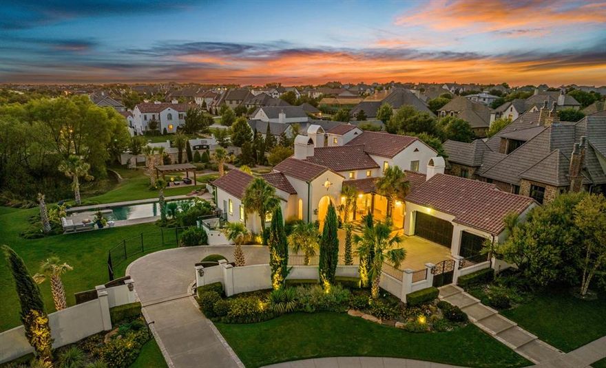 Meticulously crafted estate situated on 1.2 acres in gated & 24-hour guarded Montserrat. The winner of Fort Worth Magazine’s 2011 Dream Home, including Best of Show, Best Craftsmanship, Best Kitchen, Best Exterior Design & Elevation, & Best Master Bedroom Suite & also the winner of the Fort Worth Builders Association Kaleidoscope of Homes. This stunning estate marries indoor & outdoor spaces beautifully & is perfect for intimate or large gatherings. Open concept kitchen-living-dining, a sophisticated office space, a chic wet bar, den & kitchen equipped with top-tier appliances. Also on the main floor is a private primary suite with sitting area & its own private patio & separate guest suite off the entrance. The upper floor is home to two bedrooms, 2 full bathrooms, & living area. Outdoor enthusiasts will delight in the expansive pool with swim lane, attached spa, serene walking gardens, pergola, outdoor kitchen, fireplace, & an expansive gravel parking area with discreet rear access.