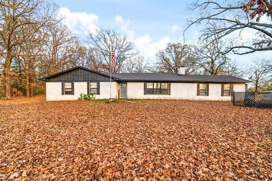 Hard to find 4 Bedroom 2 Bath on 4.06 acres with large mature Oak trees. Newly remodeled. New water heater, new AC, new septic lid and pumped in 2025, new roof, 30x40 slab ready for new shop or pickle ball court, Covered RV and boat storage. workshop.  Generator hookup in garage for emergency power. This place has it all. Room enough to build another house if you desire on county road. This one wont last long.