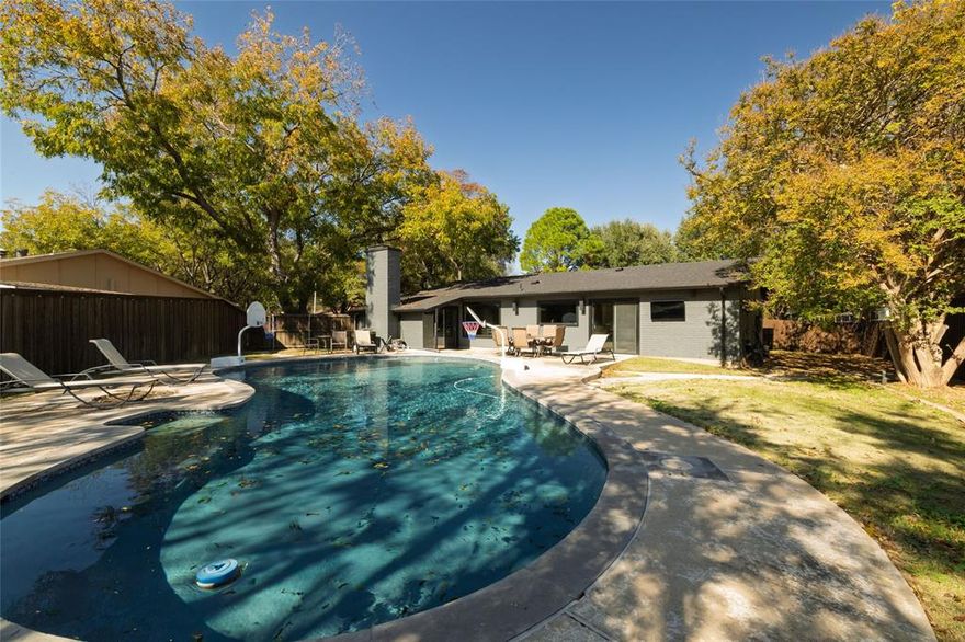 Discover this truly one of a kind home, filled with abundant updates and located in the highly sought-after Arlington ISD. Boasting beautiful curb appeal, this property offers something for everyone in the family. Upon entering, you’re greeted by a cozy living room featuring a modern fireplace and an adjacent wet bar perfect for entertaining. The kitchen sits on the opposite wing of the home and opens to a second living area. It features granite countertops, stainless steel appliances, and custom cabinetry. The bedroom quarters are thoughtfully separated from the main living areas, offering enhanced privacy. The primary suite includes an oversized bathroom with plenty of space for large furniture. Step outside to an entertainer’s paradise: a stunning pool, an expansive deck with ample room for seating, and an 8-ft cedar fence that provides exceptional backyard privacy. All electrical wiring has been redone. Foam insulation in the walls and celling that will reduce your energy bills! This home is truly a must see!