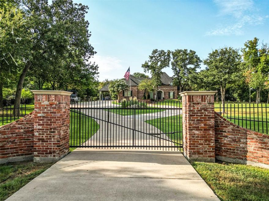 Experience the epitome of luxury and privacy in this magnificent estate property in Keller. Nestled on over 2 acres of secluded land, this home offers a lifestyle of opulence and tranquility. Indulge in the grandeur of this residence w its luxurious Quartz counters and an expansive kitchen boasting top-of-the-line appliances. The spacious primary bedroom is a retreat of its own, complemented by lavish ensuite bath that promises ultimate relaxation.
Step outside to an entertainer's paradise, a backyard that's beyond compare. Enjoy the convenience of an outdoor kitchen and living area with fireplace that overlooks a saltwater pool, set against the backdrop of the lush property. And for the sport enthusiasts, a professional sand volleyball court awaits. Inside, wood floors add to the elegance while a game room and media room provide endless entertainment possibilities. This estate is more than a home; it's a sanctuary of comfort and sophistication that's ready to elevate your lifestyle.