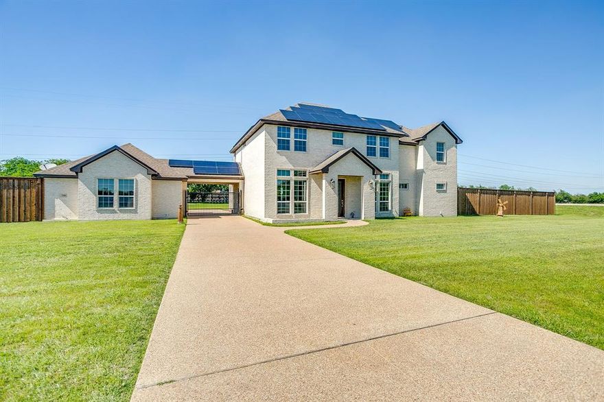 Are you looking for a spacious home on an acre with no HOA? You just found it! Custom-built by Steve Hawkins, this exceptional two-story home offers space, privacy, and thoughtful design on over an acre of fully fenced land with automatic gate for added security. Featuring 5 spacious bedrooms and 3.5 baths, this home also includes a dedicated office—perfect for working from home—and two dining areas ideal for both everyday living and entertaining. Built in 2017 and offering over 3100 square foot of space, the well-designed layout provides flexibility and comfort, while energy-efficient solar panels paired with a battery backup system offer peace of mind and potential savings should power outages occur - typical electric bill is less than $50 a month! 
Enjoy the freedom of country-style living with no HOA restrictions, all while having ample room to relax and entertain, yet close to highways and only a ten minute drive to downtown Fort Worth! VA Assumable at 2.25% interest.