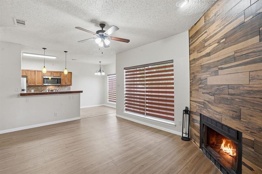 HUGE BONUS: SELLER HAS ALREADY PAID 2026 HOA DUES IN FULL! That's instant monthly savings from day one. Welcome to 4101 Esters Rd Unit 101, a beautifully remodeled 2-bed, 1-bath condo that's completely move-in ready. Step inside to new wood flooring, fresh paint, a bright open living area, and a modernized kitchen with granite counters and brand-new appliances. The renovated bathroom features stylish tile and fixtures, and the spacious primary retreat offers a walk-in closet, built-in cabinets, and a cozy wood-burning fireplace. Sip your morning coffee on the private balcony, then cool off in the sparkling community pool. HOA covers water, sewer, structure, grounds, and full facility use, and with 2026 already paid, you start ahead. Unbeatable location: minutes to DFW Airport with easy access to Hwy 161, 183, and 635. Ideal for first-time buyers, savvy investors, or anyone ready to simplify. Don't miss it. Schedule your showing today!