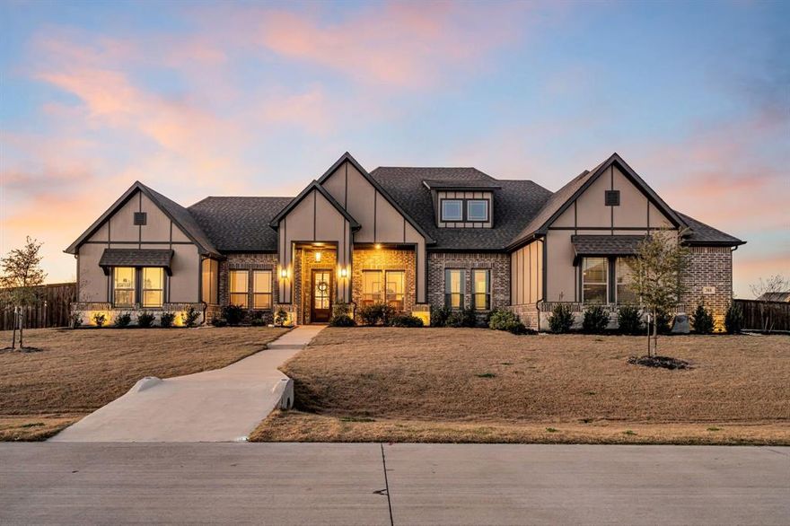 Set on 1.7 acres outside city limits with NO city taxes, this beautifully upgraded single-story home offers space, privacy, and highly rated Waxahachie ISD zoning. The property captures wide-open sunset views and features a fully fenced backyard lined with young crape myrtles—providing ample room for pets, play areas, gardening, or a future pool.
Inside, the thoughtful layout includes 4 bedrooms, a game room with its own powder bath, 3 full bathrooms, and a dedicated home office. The home is finished with fresh interior paint, natural nail-down hardwood floors, decorative ceiling beams, built-in cabinetry, and updated custom lighting that enhances each space.
The gourmet kitchen stands out with bold black cabinetry, custom hardware, granite countertops, a walk-in pantry, coffee bar, and a large island that opens directly to the family room—ideal for gatherings and everyday living. The primary suite offers a spa-like retreat with a freestanding soaking tub, dual open shower, and a bright walk-in closet.
Additional features include a spacious laundry room with folding station, a custom mudroom with built-in bench, radiant barrier and foam insulation for energy efficiency, and a 3-car garage. With acreage, thoughtful upgrades, and valuable inclusions, this home delivers exceptional value and is priced below market comps.
All appliances negotiable with acceptable offer.