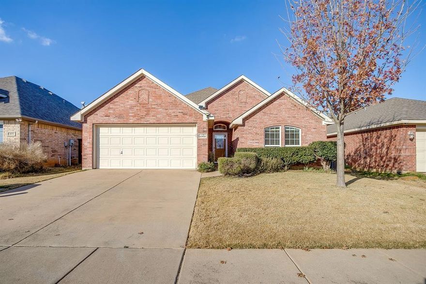 Welcome home to this beautifully maintained single-story brick residence nestled in a quiet neighborhood. This home offers 3 bedrooms and 2 full bathrooms, thoughtfully designed with a bright open floorplan, high ceilings, and fresh paint throughout. The spacious primary suite is a true retreat, featuring a large bedroom, private ensuite bath, and a huge walk-in closet.  The heart of this home is the expansive kitchen, with abundant cabinet and counter space, a walk-in pantry, and plenty of room for gathering and entertaining. The inviting living area is anchored by a cozy wood-burning fireplace, perfect for relaxing evenings. Additional highlights include a separate laundry room with room for a freezer, a 2-car garage, and a privacy-fenced backyard ideal for outdoor enjoyment. Original owners as well as smoke free and pet free a rare find! Conveniently located close to schools and shopping, this well-cared-for home combines comfort, functionality, and a perfect location.