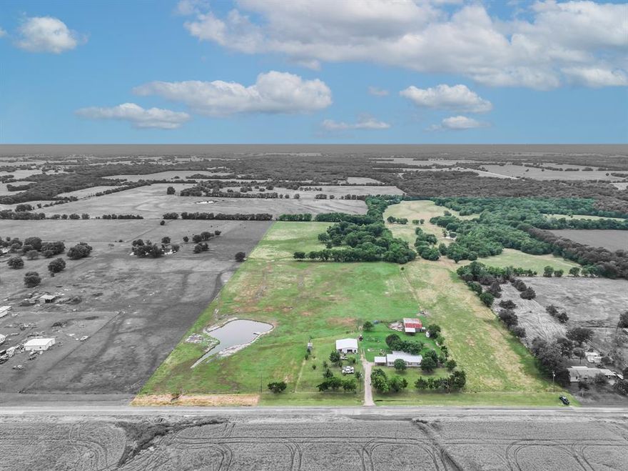 Incredible opportunity to own 72.97 acres of prime Texas land, currently operating as an active cattle ranch. This fully fenced property offers a mix of open pasture and functional ranch improvements, perfect for livestock, recreation, or a peaceful country lifestyle. The land includes two parcels—52.97 acres with an existing survey and 20 acres where the buyer will need to obtain a new survey. The property features a spacious 1,612 sq ft doublewide home with 3 bedrooms, 2 baths, 2 living areas, a cozy fireplace, a covered patio deck, and a 2-car carport—ideal for full-time living or a weekend retreat. Ranch amenities include a 40x50 barn with 2 stalls and a round pen, 3 stocked ponds, and a 40x30 metal garage complete with awning, 2 roll-up doors, electricity, a bedroom, full bath, and kitchenette—offering great potential for guest quarters or a ranch hand’s quarters. Additional improvements include two metal sheds for storage or equipment. Seller is open to conveying ranch equipment with the right offer and is willing to consider seller financing—terms dependent on down payment. Showings are by appointment only, with 24-hour notice preferred and a minimum of 3 hours notice required. Don’t miss your chance to own this turn-key ranch with endless possibilities.