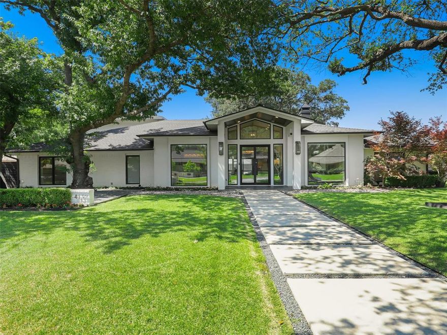 Magnificently renovated in the heart of Dallas’ coveted Private School Corridor, this resort-inspired 5-bedroom, 5 full bath estate offers 5,289 sq ft of sophisticated luxury living on a beautifully landscaped .366-acre lot in a quiet, highly sought-after neighborhood. Flooded with natural light, the home features soaring vaulted ceilings, exceptional high-quality finishes, Restoration Hardware lighting, surround sound, and expansive living spaces seamlessly connected to the outdoors. The stunning Miele chef’s kitchen opens to grand entertaining areas overlooking the architecturally designed gunite pool, spa, waterfall, and screened outdoor living and dining spaces, creating a true five-star resort experience. Exceptional amenities include an oversized prep pantry with 2nd refrigerator, dishwasher, oven, ice machine, and extensive built-ins, plus a luxurious spa-inspired primary suite with feature soaking tub and direct laundry access through the custom closet. Flexible floorplan with an additional downstairs suite ideal as a second primary, guest retreat, or multigenerational living, along with media room, playroom, and oversized garage. Every detail has been thoughtfully curated for elevated luxury living, all just minutes from Interstate 635 with convenient access throughout DFW.