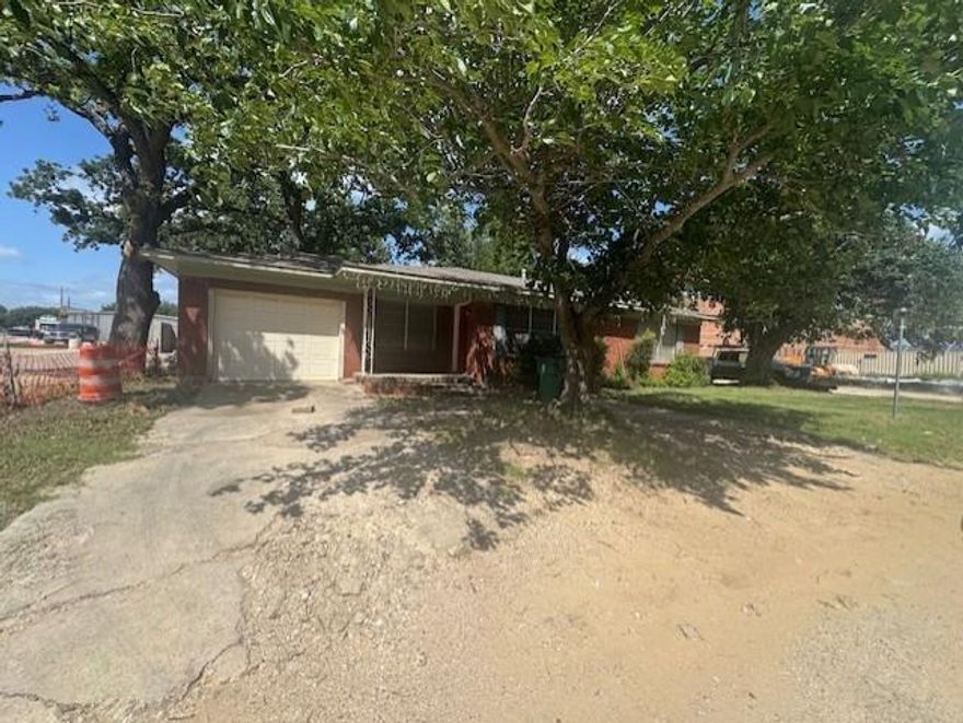 This 3 bedroom, 2 bath home is as close to campus as can be!  Right across from the parking garage and Buffalo Wild Wings!  Good sized rooms and closets.  Laundry hook ups.  One car garage.  Appliances in kitchen are built in and include a fridge.  Central heat and AC! No car, no problem... you are literally across the street from school, baseball field and the new event center! Freshly painted and ready to go!  One year lease.  Tenant pays all utilities and yard maintenance.