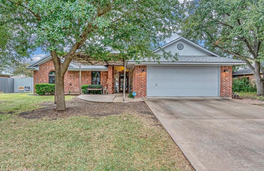 Welcome to a well-kept 3-bedroom, 2-bath home tucked into an established, quiet neighborhood shaded by mature trees and served by the highly sought-after Midway ISD. This property offers comfort, convenience, and a welcoming feel from the moment you pull up.
Step inside to a practical, easy-flow layout with plenty of natural light. The kitchen comes move-in ready with a refrigerator included, and the washer and dryer stay as well—saving you time and money on day one. Window curtains remain with the home, adding to that warm, lived-in charm buyers appreciate.  Exterior paint, water heater, vinyl plank flooring and microwave oven all replaced in the last 2 years.
All three bedrooms offer good space for rest and privacy, while the two full baths are clean, functional, and ready for everyday living.
Out back, enjoy a fully fenced yard—perfect for pets, gardening, or evenings under the stars. The covered porch gives you a great spot for morning coffee or unwinding at the end of a long day.
Located just minutes from shopping, dining, and everything Waco offers, this home blends convenience with that peaceful neighborhood feel everyone’s after.
2121 Rey is move-in ready, well-cared-for, and waiting for its next chapter. Come take a look—you’ll feel right at home.