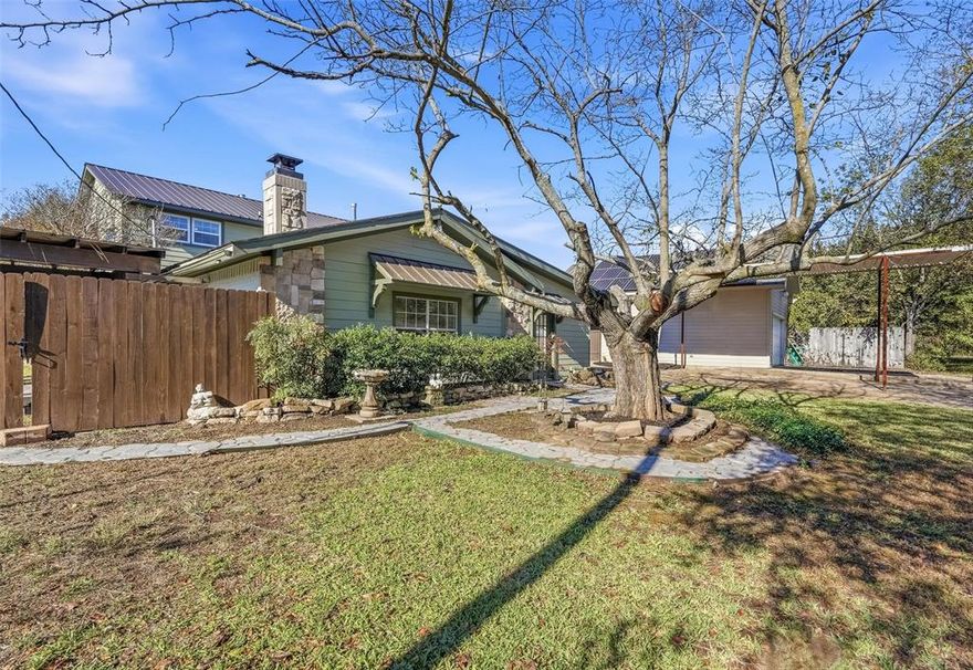 Discover this beautiful 5 bedroom, 4 bath 2 story home located at lake Tawakoni, offering approximately 2,500 sq ft of comfortable living space on an oversized lot. Designed for everyday living and entertaining, this updated home delivers generous indoor and outdoor gathering areas. The back porch is already piped for a future outdoor kitchen of your dreams, take in peaceful lake views from the upstairs balcony. A rare highlight is the second primary bedroom with a private ensuite offering excellent flexibility for multi-generational living or guests. Additional property features include a greenhouse, oversized 2 story detached garage and covered RV parking. With its lakeview setting, oversized lot and versatile layout, this property offers incredible potential as a full time residence, vacation home, or income producing investment.