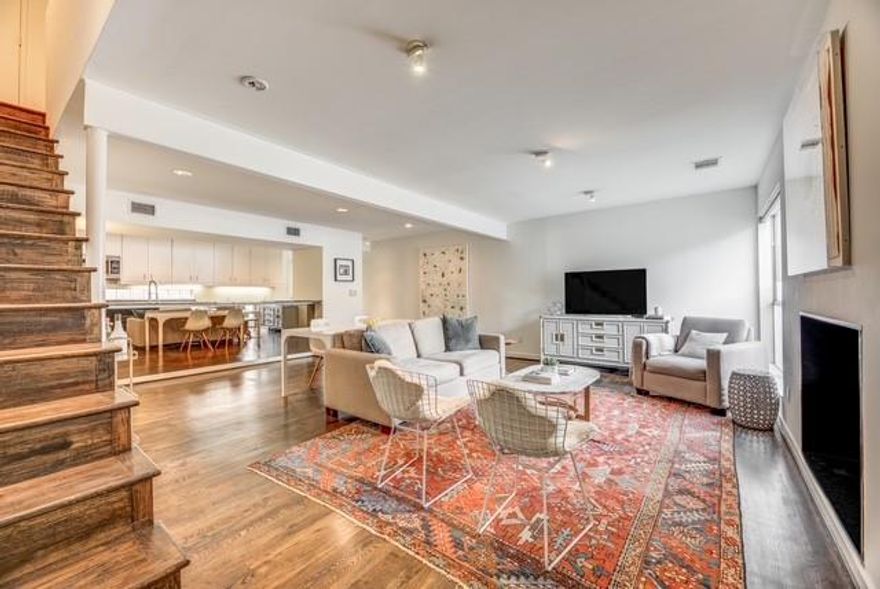 Step into this sophisticated two-story condo featuring rich hardwood floors, smooth museum-finished walls, designer lighting, custom blinds, and a Nest thermostat for modern comfort. The spacious open-concept living and dining area flows effortlessly into a breakfast bar that spans the length of the kitchen—perfect for entertaining or everyday living. The expansive galley kitchen offers abundant cabinetry, stainless steel appliances, granite countertops, and a generous pantry. Upstairs, you’ll find two roomy bedrooms, each with a private en-suite bath and custom closet systems. A conveniently located laundry closet sits in the upstairs hallway, while a stylish half bath serves the main floor. The home includes one reserved covered parking space, along with 2 covered guest parking spaces on a first come basis, and ample street parking. Ideally located within walking distance to Katy Trail, Uptown, and Knox—and just down the street from Beverly’s—this condo blends comfort, style, and unbeatable convenience.