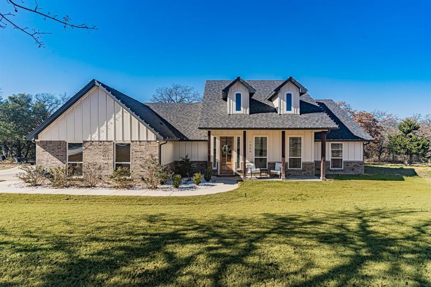 Welcome to this charming 3 bed, 2 bath home located in a quiet, established neighborhood on 2 acres! Offering peace and privacy outside city limits. The property also includes vast topography towards the back with a seasonal creek, large trees, and frequent wildlife crossings! Inside the home, you'll find an inviting and open layout, vaulted ceilings, cozy gas fireplace, gas cooktop, master bedroom with a large walk-in closet, spacious secondary bedrooms, and more! Step out back to a large covered patio plumbed with gas, cooking area with countertop space and cabinet storage, established and well-kept yard with a sprinkler system - the perfect outdoor setting for entertaining, cookouts, and gathering with friends and family. Located in sought-after Peaster ISD schools, only 25 minutes to Weatherford including shopping, entertainment, restaurants, etc and 30 minutes to Costco with convenient access via Rick Williamson! This home is a must-see for anyone looking for privacy and charm. Don't miss out on this great home!