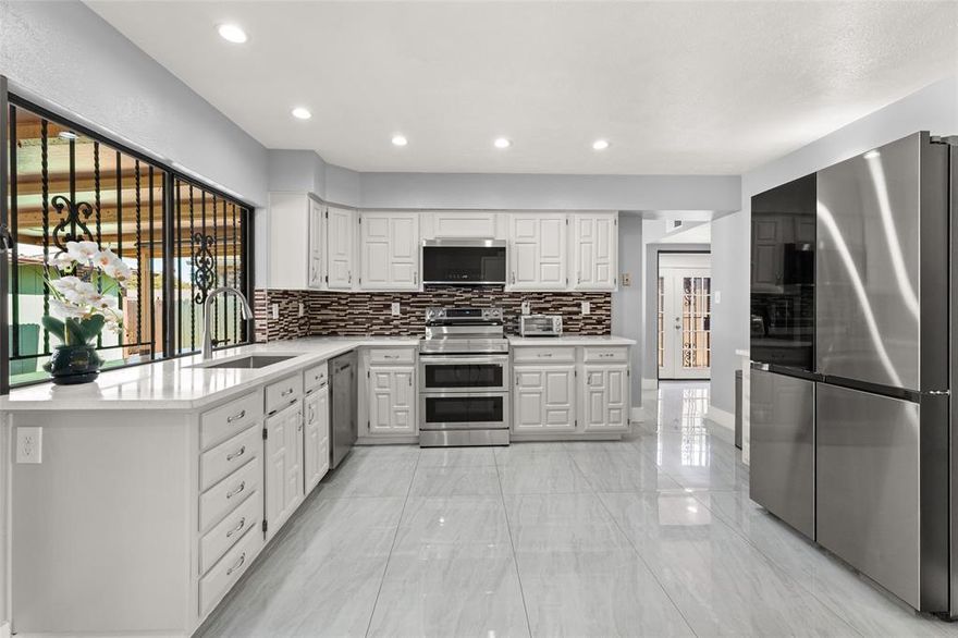 Beautifully updated 3-bedroom, 2-bath home in a prime Dallas location just 14 minutes from the Dallas Arboretum and Botanical Garden and White Rock Lake. This move-in ready home features two dining areas and a wet bar perfectly situated between the main living and dining spaces, ideal for entertaining. Recent updates include new flooring, recessed lighting, remodeled bathrooms, and a new roof in 2023. The refreshed garage adds a clean, polished touch, and the outdoor storage shed provides extra space for organization. Don’t miss this well-maintained, centrally located gem!