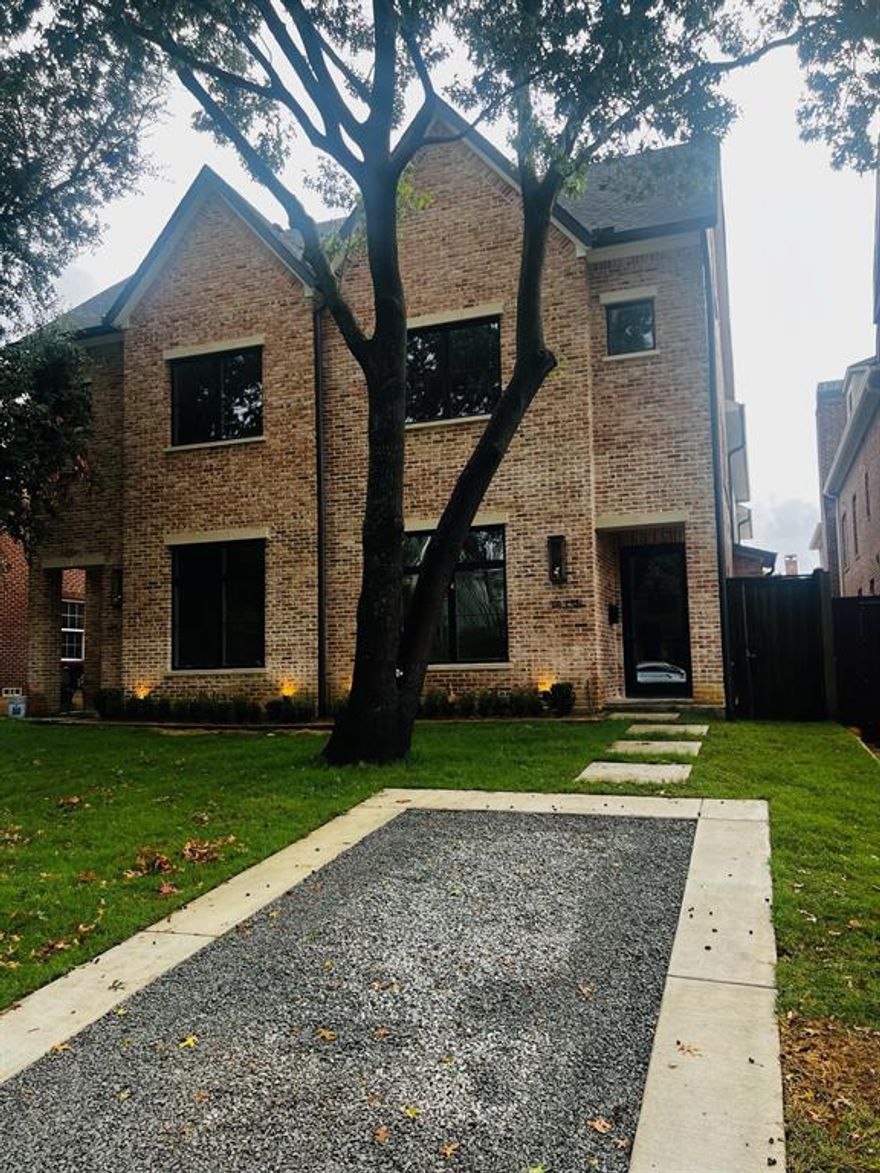 Welcome to 3433 Granada B, a stunning 3,528 sq ft new construction home almost completed! Featuring 4 bedrooms, 5 bathrooms, a study, and a spacious upstairs game room, this home perfectly blends modern luxury with timeless design. The exterior boasts antique-style brick with cast stone accents, Marvin windows, and elegant gas entry lanterns, along with front and rear parking. Inside, white oak hardwoods flow throughout, complementing a cozy built-in gas fireplace. The gourmet kitchen is a chef’s dream, offering quartzite countertops, GE Monogram appliances, soft-close custom cabinetry, and abundant natural light. The master suite is a true retreat, with vaulted ceilings, dual custom walk-in closets, and a spa-like bath featuring a dual-entry shower, freestanding tub, and custom-stained cabinets. The versatile study can serve as a fifth bedroom, while secondary bedrooms each offer en-suite baths and walk-in closets. Energy-efficient foam insulation enhances comfort year-round.