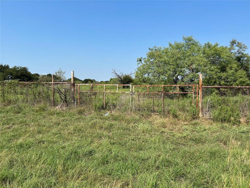 PRIME 5 ACRES ON HIGHWAY 281 OUTSIDE OF MINERAL WELLS...Discover the possibilities with this 5 acre tract of land conveniently located right off of highway 281 and a few miles outside the Mineral Wells city limits.  This property provides high visibility, easy access, and a clear slate to create your own homesite, commercial use, or long-term investment property.  Property has access to electricity and water but there is no septic or well. There are two trailers and an old RV on the property and the seller is willing to remove.
