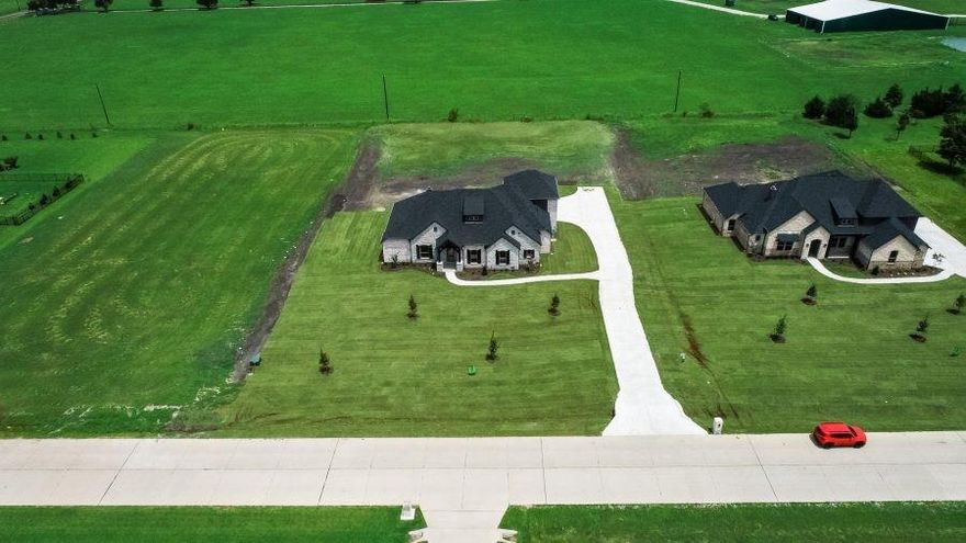 Single-owner home in a gated community, built in 2021 by Crescent Home Builders. This spacious 4-bedroom home features 3 full bathrooms, 2 half bathrooms, an office, and a game room above the 3-car garage, all situated on a 1-acre lot.

The luxurious kitchen includes an oversized granite island, granite countertops, stainless steel appliances, and a double oven. Wood floors run throughout the common areas, with carpet in the bedrooms and game room.

The large primary bathroom offers marble countertops and a spacious walk-in shower. The game room has plenty of space for a pool table. Outside, enjoy a gated backyard with a septic system and a sprinkler system covering the entire property.