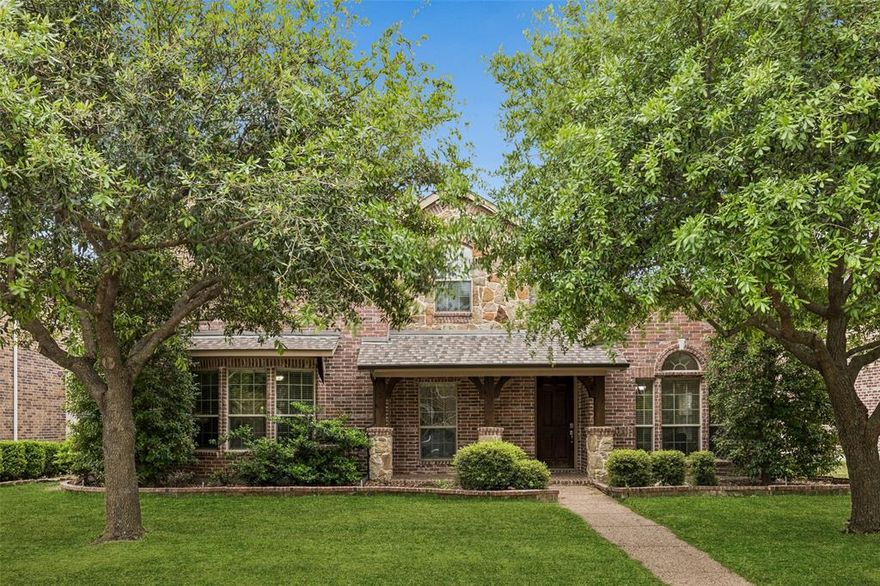 Elegant and inviting, this beautifully maintained 4-bedroom, 3.5-bath home in Frisco offers comfort, style, and exceptional livability. A north-facing, move-in ready residence, this home showcases beautiful wood-look flooring that flows through the entry, rotunda, living area, study, and formal dining space, creating a warm and cohesive feel. The thoughtfully designed kitchen features granite countertops, stainless steel appliances, Alder wood cabinetry, and a convenient butler’s pantry—ideal for both everyday living and entertaining. The main living area impresses with soaring ceilings and a cozy gas log fireplace that serves as a striking focal point. The private primary suite offers a relaxing retreat with dual sinks, a spa-inspired soaking tub, separate shower, and a generous walk-in closet. Secondary bedrooms provide flexibility for guests, work, or hobbies. Enjoy outdoor living on the covered patio complete with flagstone and a built-in grill, perfect for gathering and entertaining. The vibrant community offers access to a greenbelt, spray park, and community pool, enhancing the overall lifestyle experience. Located within highly regarded Frisco ISD, this home presents an outstanding opportunity to own a well-appointed property in a sought-after area.