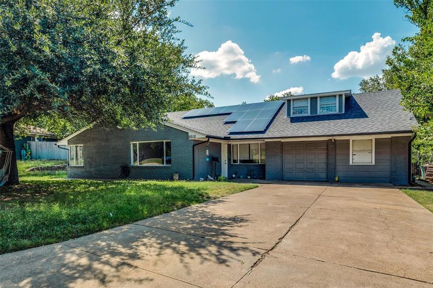 Rare chance to purchase a home using an assumable loan at low rate! Welcome to a home where sustainability meets stunning size. This expansive five-bedroom, two-story residence is a brilliant financial investment, featuring a premium solar panel system that will be completely paid off at closing. This valuable upgrade dramatically reduces your monthly energy bills, providing immediate, long-term savings and minimizing your environmental footprint—making a smart purchase even smarter. Beyond the low operating cost, this home offers exceptional space and flexibility. Boasting five generously sized bedrooms, including the versatility of two master bedroom options, the layout effortlessly accommodates large families, guests, dual home offices, or dedicated hobby areas. Step inside to a bright, open floor plan perfect for modern living and entertaining. The main level features a spacious living area and a well-appointed kitchen with updated appliances. Upstairs, the private quarters include a primary suite with a massive walk-in closet. Outside, the huge backyard and concrete patio provide ample open space to enjoy the outdoors.