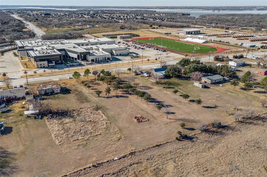 Rare opportunity to own approximately 0.75 acres in the heart of Little Elm with no HOA, no MUD, and no PID. This oversized lot gives you the freedom to build the home you actually want without extra restrictions or added tax layers. There’s a small distressed existing home on the property that can be renovated or removed, giving you options. Tear it down and design your dream home from scratch, or explore a remodel if that fits your vision. The lot is mostly open with minimal trees, making it easier and more cost-efficient to prepare for new construction.

Enjoy being just minutes from Lake Lewisville, including boat ramps, beaches, marinas, trails, and lakefront events. The area continues to grow with new retail, restaurants, and community development, supporting long-term value and strong buyer demand. Ask about the One-Time Close New Construction Loan! Land, Demolition, and Construction all funded! Minimum 620 FICO and 5% down

Large lots like this are becoming harder to find in established areas of Little Elm. With room to build, expand, or simply enjoy extra outdoor space, this property offers flexibility you don’t typically get in newer subdivisions.

Buyer to verify zoning, utilities, schools, and development requirements.