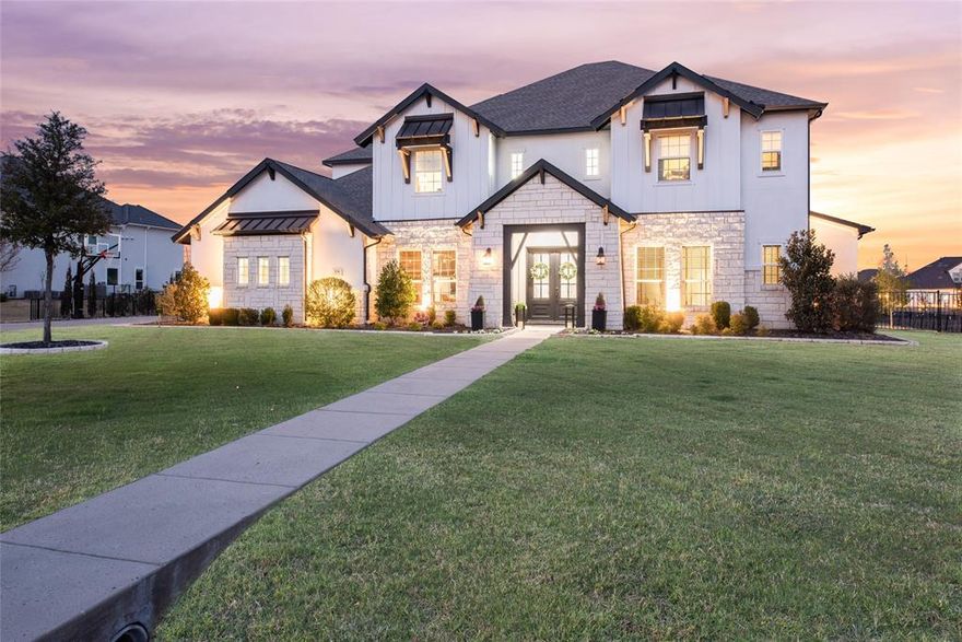 Stunning home showcasing custom design features and accents creating a truly exceptional living experience in the desirable Lovejoy ISD.  The distinctive and unique character of this home is evident as soon as you step through the beautiful double doors. Just off the impressive foyer is an office with french doors located across from a formal living room that has been thoughtfully transformed into an inviting area featuring the rich texture of brick flooring along with custom built cabinetry that offers both practical storage and a stunning showcase for curated decor, books, or a well-stocked bar. The dining room is adorned with a dazzling chandelier creating a warm and inviting ambiance. The home flows easily into the open concept kitchen and living areas filled with natural light from the expansive windows.The kitchen is a chef’s dream, featuring a brick wall, quartz countertops, a sprawling island with bar seating and top of the line appliances that make both everyday cooking and entertaining effortless. The heart of the home extends outdoors, where a beautifully designed outdoor kitchen invites al fresco dining and entertaining. Overlooking the sparkling pool, an additional patio with ample space provides the perfect setting for gatherings. Tucked away on the first floor providing much desired privacy is the primary suite with views of the backyard and a spacious primary bath featuring his and hers walk-in closets.  There are two staircases that lead to the 2nd floor where you will find 3 generously sized bedrooms, 2 full baths and a bar area conveniently positioned between the game room and media room. This home is full of fabulous upgrades you must see in person! Every detail of this home has been thoughtfully designed to blend luxury, style and comfort.