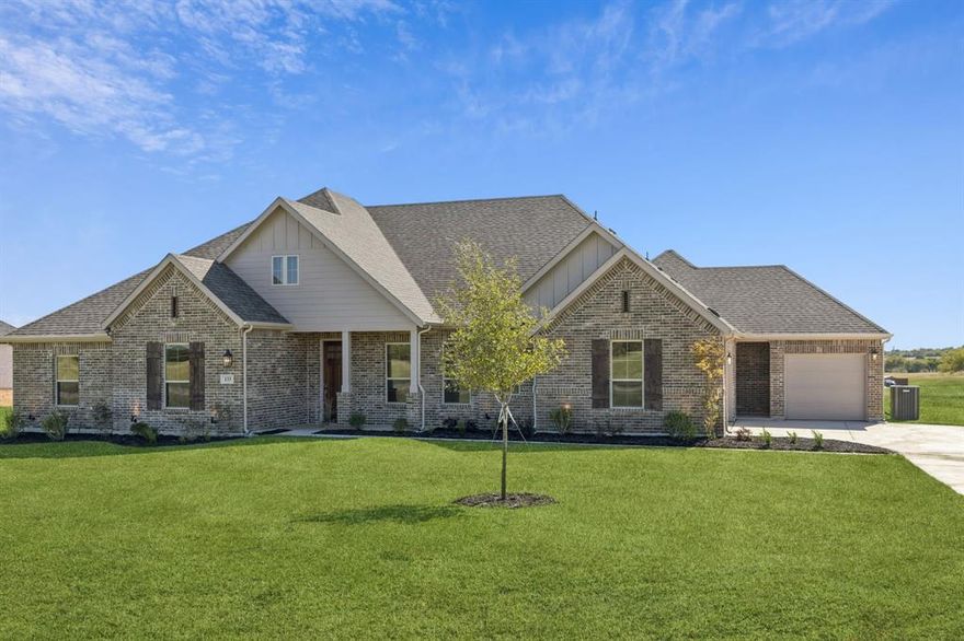 Move-in ready new construction in Lakeway Estates, zoned to Waxahachie ISD with No MUD and No PID. Situated on 1.35 acres with pond views, this single-story home offers 3,227 sq ft, 4 bedrooms, 2.5 baths, study, media, gameroom, and a 3-car garage with 2-car swing entry and a convenient interior side entry into the home.
Open-concept design with high ceilings, large windows, and abundant natural light. The kitchen features a quartz island, upgraded cabinetry with cabinet pulls, stainless steel Whirlpool appliances, and champagne-bronze hardware throughout.
Private primary suite includes dual vanities, soaking tub, walk-in shower, and oversized closet. Secondary bedrooms all include walk-in closets. Spacious utility and mud room with built-ins.
Energy Star Certified with spray foam insulation and Honeywell smart thermostat for efficiency.
Extended covered patio overlooks a large backyard ready for future plans.
Minutes from Lake Waxahachie, parks, Historic Downtown, and HEB with easy highway access.
Bonus: 1.35-acre lot, pond views, energy-efficient construction.