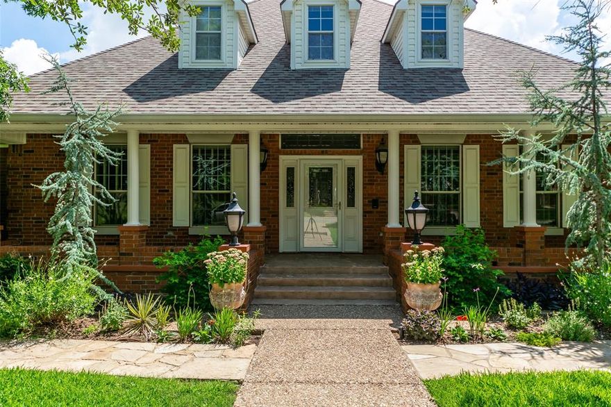 Set on over half an acre, an extraordinary custom-built estate nestled on a quiet street in one of Sherman’s most established neighborhoods. Spanning over 6,200 square feet, including a rare full walk-out basement, this residence is designed to accommodate multigenerational living, remote work, and entertaining.  A 26x20 detached workshop provides space for projects, hobbies, or a home-based business, while the detached three-car garage offers abundant parking and storage. A flexible floor plan includes 4 spacious bedrooms and 5 full bathrooms, with two bedrooms and two baths on the main level—ideal for various living needs. The main floor features a formal dining room, dedicated office, large living room with a substantial wood-burning fireplace, and a charming sunroom perfect for morning coffee or evening relaxation. The kitchen is centrally located with easy access to both casual and formal spaces.Downstairs, the walk-out basement includes two additional bedrooms and three bathrooms, a second living space with fireplace, game room, bonus areas, a private workout room, and a second laundry—ideal for guests, teens, or in-laws. Outside, enjoy a covered patio, gazebo, basketball court, and fenced playground..Recent upgrades include new roof, multiple new HVAC units and two new water heaters, upgraded fireplaces, new sump pumps, and a reverse osmosis water system. Homes with this blend of design, square footage, and rare features are nearly impossible to find in North Texas. Whether you're looking to upsize, create generational roots, or simply invest in a one-of-a-kind property this home offers the flexibility, charm and value that make it a true standout. Don’t miss your chance to own one of Sherman’s most distinctive and well-maintained estates.