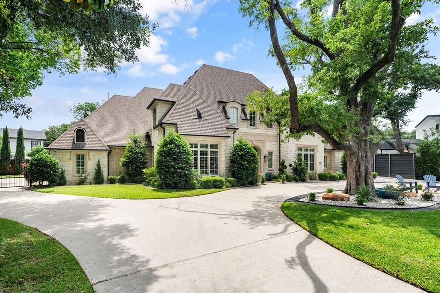 Nestled in Dallas's coveted private school corridor, this stunning .57-acre estate at 4674 College Park Drive offers the lifestyle you've been dreaming of. This 6-bed, 8-bath French Traditional masterpiece spans 6,518 sq ft of refined living. The chef's kitchen stuns with double islands, Sub-Zero & Wolf appliances, and a generous butler's pantry and bar built for entertaining. It is rare to find three bedrooms downstairs — including a flexible third perfect as an in-law suite, home gym, or private office. Each bedroom boasts an en-suite bath and plenty of closet space. The garage features two electric car charging plugs and an RV hookup for the ultimate in modern convenience. Step outside to your personal resort: sparkling pool, lush lawn, and a covered patio with remote control screens, built-in grill, fireplace, and bar. Every evening becomes an event. This is more than a home — it's where your story begins.