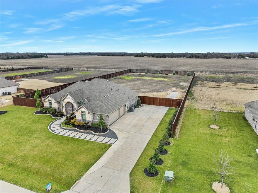 6309 Starr Drive, McKinney, TX 75071

No neighbors behind! Yes you can have chickens. 

Welcome to your private retreat on 1.181 acres in McKinney ISD with an incredibly low 1.33% tax rate.

This beautifully maintained property offers the perfect blend of thoughtful upgrades, functional improvements, and outdoor living designed for the Texas lifestyle.

The recently painted interior feels fresh and inviting, complemented by updated light fixtures, enhanced bathroom mirrors, and ceiling fans in the bedrooms for added comfort and efficiency.

Outside, the curb appeal truly shines. Professionally designed natural stone flower beds elevate the front elevation, while established landscaping creates both beauty and natural privacy. A modern sidewalk adds character and functionality, and upgraded exterior lighting enhances the home’s evening presence.

The extended driveway provides generous parking, and gutters along with improved drainage systems in the front and side areas ensure proper water management year-round.

Step into the spacious backyard designed for both relaxation and entertaining. Enjoy evenings under the covered patio featuring a warm wood ceiling, or tend to your dedicated vegetable garden area complete with its own irrigation system. Additional irrigation supports trees and key landscape areas, promoting long-term health and balance through every Texas season.

This is more than a home — it’s a thoughtfully upgraded property with space to breathe, grow, and entertain.