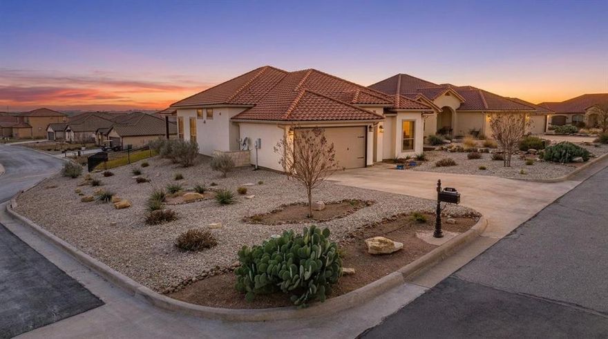 Stunning Spanish-style home located in the highly sought-after Tuscan Village subdivision in Glen Rose. From the moment you step inside, you’ll be captivated by the soaring 12-foot ceilings accented with wood beams and an open-concept layout that seamlessly connects the living, dining, and kitchen areas. Abundant windows fill the space with natural light. The chef’s kitchen is a showstopper, featuring granite countertops, an oversized island, double ovens, and a spacious butler’s pantry offering exceptional storage. The living area is anchored by a striking stone fireplace with a low-maintenance electric insert. The primary suite is a true retreat with vaulted ceilings and a spa-like ensuite bath complete with a soaking tub, separate vanities, a walk-in shower, and an impressive 160-square-foot walk-in closet. A versatile flex room just off the main living area is perfect for a home office, media room, or creative space. Two additional bedrooms and a full bath are thoughtfully positioned in a separate wing, providing privacy for guests or family members. The oversized utility room offers abundant cabinetry, storage, and convenient mud space. Enjoy outdoor living on the covered back patio overlooking scenic Hill Country views and a large, fenced backyard with a sprinkler system—perfect for relaxing, entertaining, or play. Additional highlights include spray-foam insulation for excellent energy efficiency, clay tile roof, and access to outstanding neighborhood amenities, including a community pool, clubhouse, fishing pond, and walking trails. Located within the highly acclaimed Glen Rose ISD, making this home an exceptional opportunity for comfort, style, and lifestyle living.
