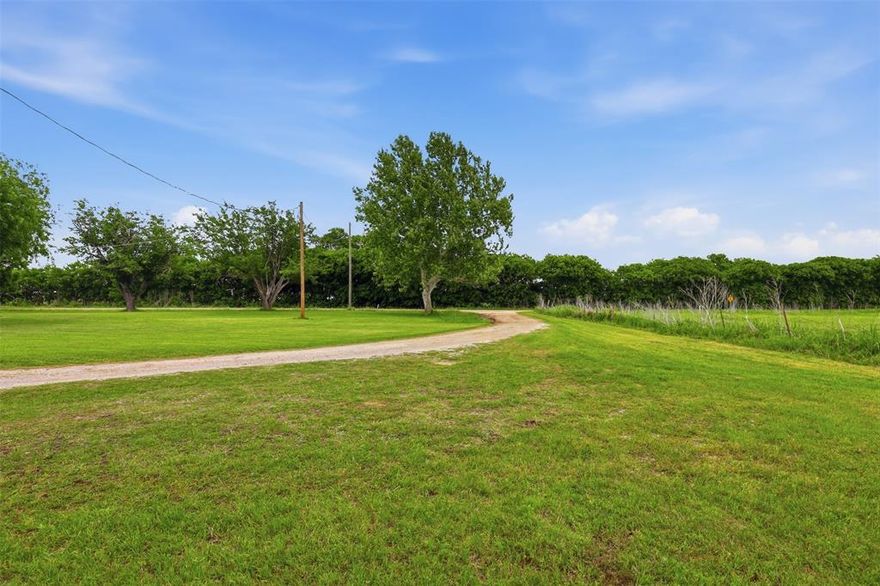 Charming just under 9 acres of ag exempt land with barns and endless potential. This beautiful one of a kind property offers the perfect opportunity to restore the existing home currently being gutted, rebuild, or simply enjoy country living at its best. The land is highly productive and currently produces approximately 35 round bales per cutting, making it ideal for hay production or continued agricultural use. A classic barn provides functional space for storage, equipment, or livestock, along with an old dairy barn that reflects the rich history of this once family owned and operated property. Utilities are already in place with fiber optic internet available, water provided by Johnson County Special Utility District, Co op Electric, a propane tank in place owned by the seller, and a septic system on site. This property also has an old Water Well. The property features a wonderful mix of open pasture and mature trees, creating a peaceful and scenic setting. Enjoy the privacy of country living while still being conveniently located close to the metroplex with easy access to the Chisholm Trail Toll Road. This unique property offers endless possibilities to create your ideal country lifestyle.