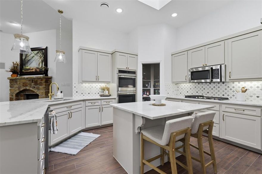 Welcome to this beautifully maintained home in the desired neighborhood of Hidden Vistas! This recently remodeled home can be a 3 bedroom 2.5 bath plus an office or 4 bedrooms! Open concept floor plan filled with tons of natural light. New ceramic wood tile throughout main areas of home. The chef's kitchen is a true centerpiece featuring new shaker cabinets, new SS appliances, gas stovetop, beautiful quartzite, and a large center island. Butlers pantry off kitchen with drink fridge. Two bedrooms are joined by a remodeled Jack-n-Jill bathroom. Covered back patio with outdoor kitchen. Newer roof! Conveniently located near dining, shopping, and I-35, this home combines style, comfort, and location all in one! Walking distance to Bailey Lake and brand new indoor pickleball facility set to open soon!