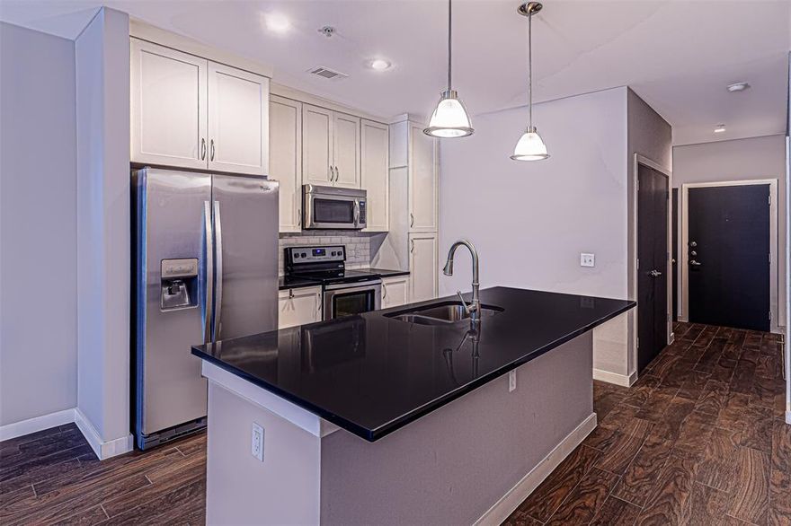This gorgeous property has all the benefits you're looking for- plus priced to lease quickly! Location is ideal- with a gastropub downstairs, DART tracks steps away, so many restaurant choices nearby, and right next to SMU. Amenities include gym onsite, party room, gorgeous views from the patio, and a dog run for your pet. Inside you'll find luxury vinyl flooring throughout, which gives a cohesive flow from room to room. Quiet location in the building. Absolutely pristine inside. One assigned parking space, and additional parking available nearby.