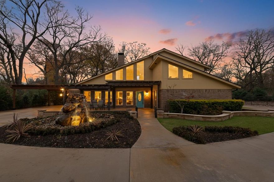 Newly listed in sought-after Lovejoy ISD! This outstanding modern mid-century home is nestled among mature trees on 1.836 acres, offering peaceful privacy and beautiful views from the home.

The property features four bedrooms and two remodeled bathrooms, along with a newly remodeled kitchen. Recent updates include recently replaced windows, a new metal roof and gutters, a recently replaced HVAC system, and water heater. Carpet has been replaced with durable ceramic tile throughout. Primary Bath features double sinks, walk in shower and huge walk in closet. Kitchen features granite countertops, breakfast bar and white appliances. All appliances remain with the home including refrigerator and washer and dryer. 

Additional amenities include a two-car carport, two-car garage, storage shed, spacious covered front and back patios, chicken coop, mini gardens, established landscaping, and an electric metal gate. Peaceful, private, and full of charm. This is a rare find!

Floodplain notice: This home is located in a floodplain. Flood insurance will be required. Buyers are encouraged to visit the FEMA website for additional information and to verify all information, restrictions, and requirements.

Buyer to verify ALL info and restrictions including room measurements, taxes, school info and listing details!