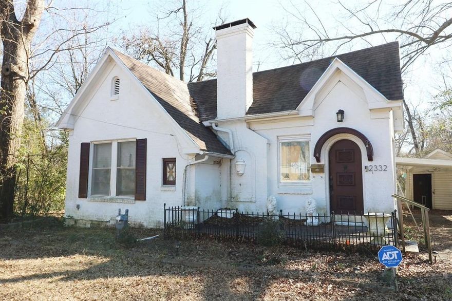 Opportunity – Tudor-Style Home with Upside Potential
This 2-bedroom, 1-bath Tudor-style home in Paris offers both character and potential. Steep rooflines, painted brick, and an arched entry create instant curb appeal, while inside, a masonry fireplace anchors the main living area, which flows into a functional kitchen with ample counter space and direct access to the sunroom. The primary bedroom is generously sized, and the secondary bedroom provides flexibility for a guest room, office, or hobby space, making the layout adaptable to multiple uses.
The property will need some updates and repairs, giving buyers with vision the chance to enhance both function and value. Features like the vintage greenhouse, connected layout, and open yard provide multiple ways to increase appeal, whether for resale or long-term rental positioning.
Set on a 9,452 sq ft lot in an established neighborhood with convenient access to local amenities, this home combines distinctive character with clear upside potential. Sold as-is; inspections and contractor evaluations are recommended to assess opportunities.
