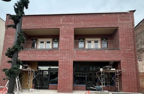 Photo of 317 W Main Street #201, Denison, TX 75020 (MLS # 21159744)