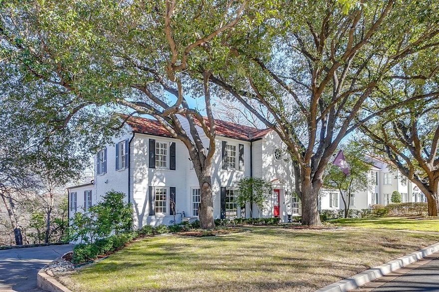 Luxurious Home full of Character & Charm Overlooking TCU Campus & Stadium in the heart of Fort Worth's Historic Colonial Hills Area within walking distance of TCU & Colonial Country Club. Beautifully updated throughout with 3 spacious bedrooms on the 2nd floor & an oversized 4th bedroom with ensuite bath on the lower level along with a built-in wine cellar, wet bar, and living room with stone fireplace, making it ideal for a mother-in-law suite or NextGen Living. The gorgeous Kitchen overlooking the Piano Room & Breakfast area, features white cabinetry, marble backsplash & countertops, Professional Grade Stainless Steel Viking Appliances including a double oven, sub-zero refrigerator, & commercial-style gas cooktop. Adjacent to the Kitchen & Formal Dining Room, the Butler's Pantry features a built-in Wine Cooler & Sonic Ice maker! Perfect for enjoying summer afternoon ice tea on the balcony. Just Minutes from Downtown Ft Worth, The Cultural & Medical Districts & The Shops at Clearfork!