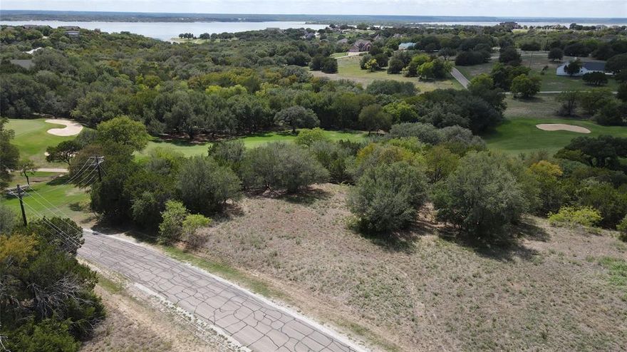 Two lots totaling over a half acre in the beautiful subdivision, White Bluff resort. These lots are located near the golf course, the 19th hole restaurant and not far from the marina the lake. Seize the opportunity to secure this site to build your dream home and enjoy all the amenities that White Bluff has to offer. The purchase of this package comes with free rounds of golf per year or a fitness center key card.