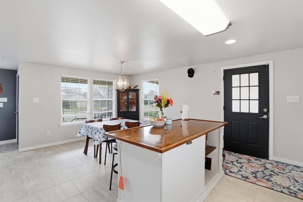 7701 John T White Road