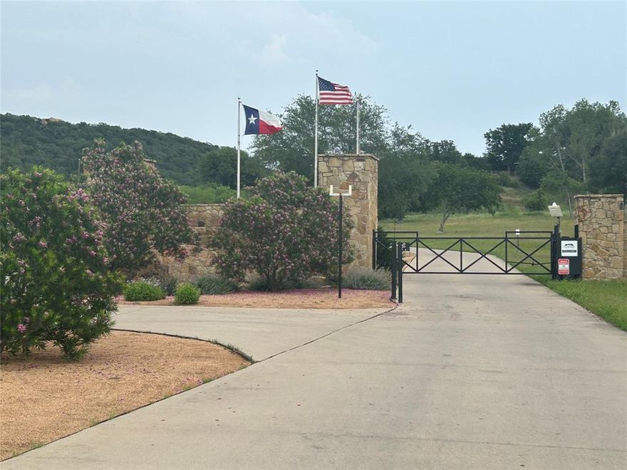 Discover the perfect blend of privacy and luxury with this exceptional 1.08-acre lot in a gated community in Gordon, Texas. Nestled against a greenbelt, this property offers unparalleled seclusion, making it the ideal canvas for your dream home. Enjoy breathtaking views throughout the community, creating a peaceful, off-the-grid lifestyle while remaining close to the conveniences of neighboring cities.
Indulge in top-tier community amenities, including a beautifully designed clubhouse with a full kitchen and ample seating—perfect for hosting events. The ALR Recreation Center elevates everyday living with a resort-style pool, gym, game tables, movie theater, outdoor grills, and more. Nearby, the Eagles Nest entry point boasts a large fire pit and panoramic views of the stunning terrain.
Greenbelt-backed lots are highly coveted, so don’t miss this rare opportunity. Schedule your showing today and start envisioning life in this serene and exclusive community.