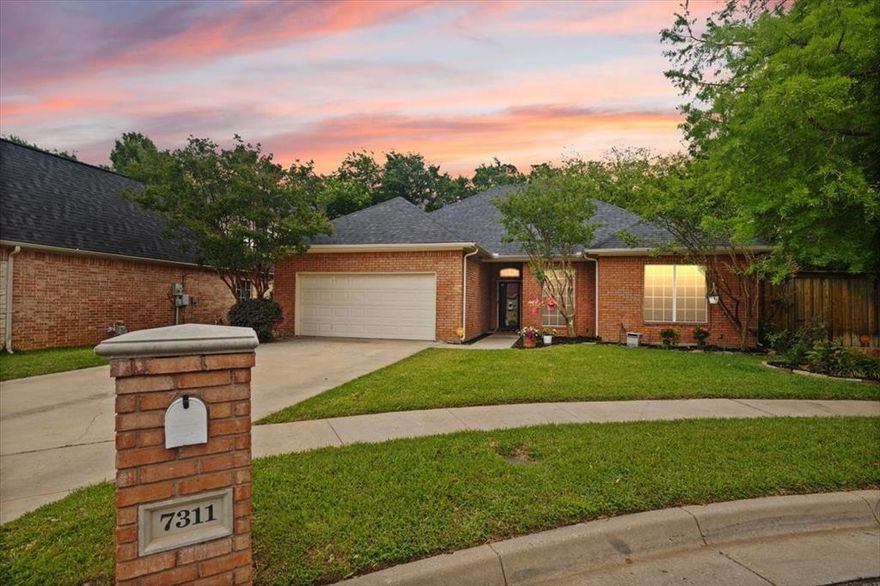 Welcome to your new dream home! This property is an open floor plan, split bedroom, updated home that shows care and quality with all of the details. The home offers freshly painted interior, hand scraped engineered hardwood throughout living areas, granite counters in the kitchen and bathrooms, and updated lighting fixtures. The expansive primary suite boasts an oversized en suite bathroom with a jetted tub and separate shower, as well as the walk in closet of your dreams. Storage won't be an issue in this home with large closets, cabinets, utility room, and even a finished out garage with epoxy flooring. The backyard is your own peaceful paradise with large trees and high fences creating the feeling of seclusion, an oversized patio, and a pond ready to stock with your own fish. BONUS: Check out the additional building currently being used as a craft room and library, but ready to be your work from home office. Located in a quiet cul-de-sac in the Mansfield School district! Two year old roof and new paint throughout. Buyer and buyers agent to confirm all information. Agent is the owner.
