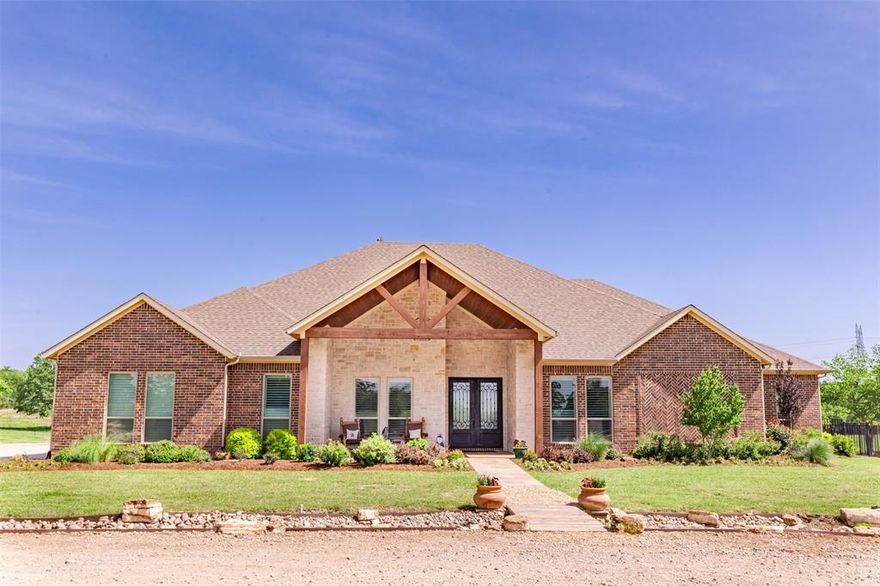 WOW! The North Texas Retreat you've been waiting for! This stunning property has something for almost everyone! First, the property sprawls over 10 acres located between Alvord and Decatur and has the amenities you are looking for!  The property features an absolutely gorgeous Schedcik custom home that was completed in 2021-2022. The home stuns with just over 3900 sq ft, large picture windows overlooking a massive back patio and a 12 foot deep pool that has features such as a grotto, waterfall, attached hot tub, and swim up table! The home is a 3 bed each with full ensuite bath, wide hallways and doorways,  workout room, Media room with a wet bar and full bathroom next to it Which could function as a 4th bedroom if needed, very well appointed high end finishes throughout such as hardwood floors, solid doors, storm room built in, butler pantry with grocery door from the garage and commercial grade kitchen appliances! The appliances are a 6 burner gas cook top, convection oven with warming drawer, built in refrigerator, dishwasher, and microwave in the island. If you don't want the pool company in the house, the separate she shed or pool house has a small kitchenette area bathroom, or a place to get out of the sun. There is no shortage of space on this property. The home has oversized 3 car garage that will fit a 1 ton truck and full size SUV comfortably, a detached shop has roll up doors for additional storage for mowers or farm implements. If you have frequent extended stay guests, the shop also features its own living quarters with a 1 bed 1 full bath apartment with living room, kitchen and its own covered patio to enjoy the morning coffee! This property has so much to offer. Ample acreage with plenty of room for activities, a phenomenal place to entertain friends and family, have a few animals,  or just sit back and relax by the pool at your home on the range! Option for additional 84 acres of land as well!
